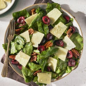 beet greens salad with cherries and pecans